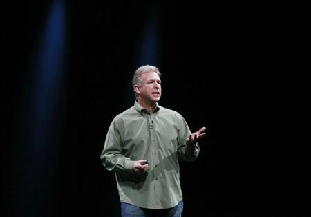 Phil Schiller, senior vice president of worldwide marketing at Apple Inc., speaks from the stage during the Apple Worldwide Developers Conference 2012 in San Francisco, California June 11, 2012. REUTERS/Stephen Lam