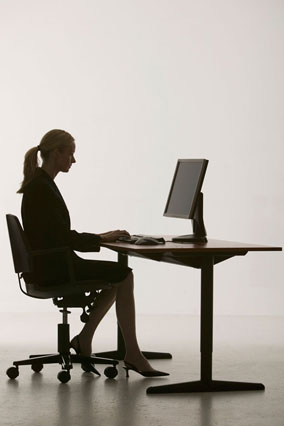 201109-orig-fit-work-woman-desk-silhouette-284x426