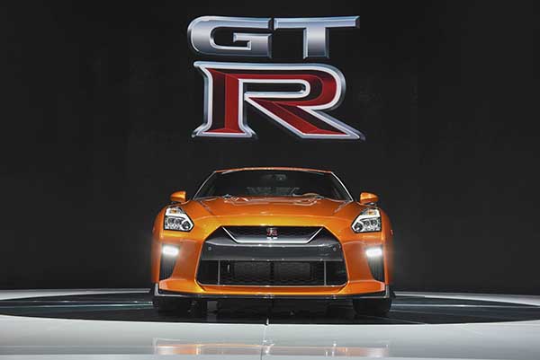 The Nissan Motor Co. 2017 GT-R sports vehicle is displayed during the 2016 New York International Auto Show in New York, U.S., on Wednesday, March 23, 2016. Nissan unveiled the latest version of its halo car, the Nissan GT-R. This is the latest update to the two-door, 2+2 sports car the company unveiled in 2007. Photographer: Ron Antonelli/Bloomberg